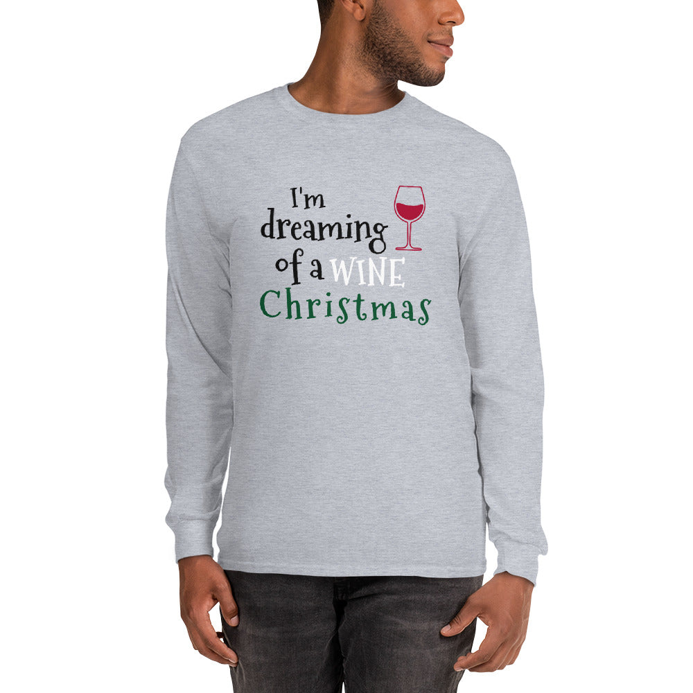 person wearing a grey long sleeve tee shirt with a red wine glass and text that reads 'I'm dreaming of a wine Christmas' in black, white, and green letters
