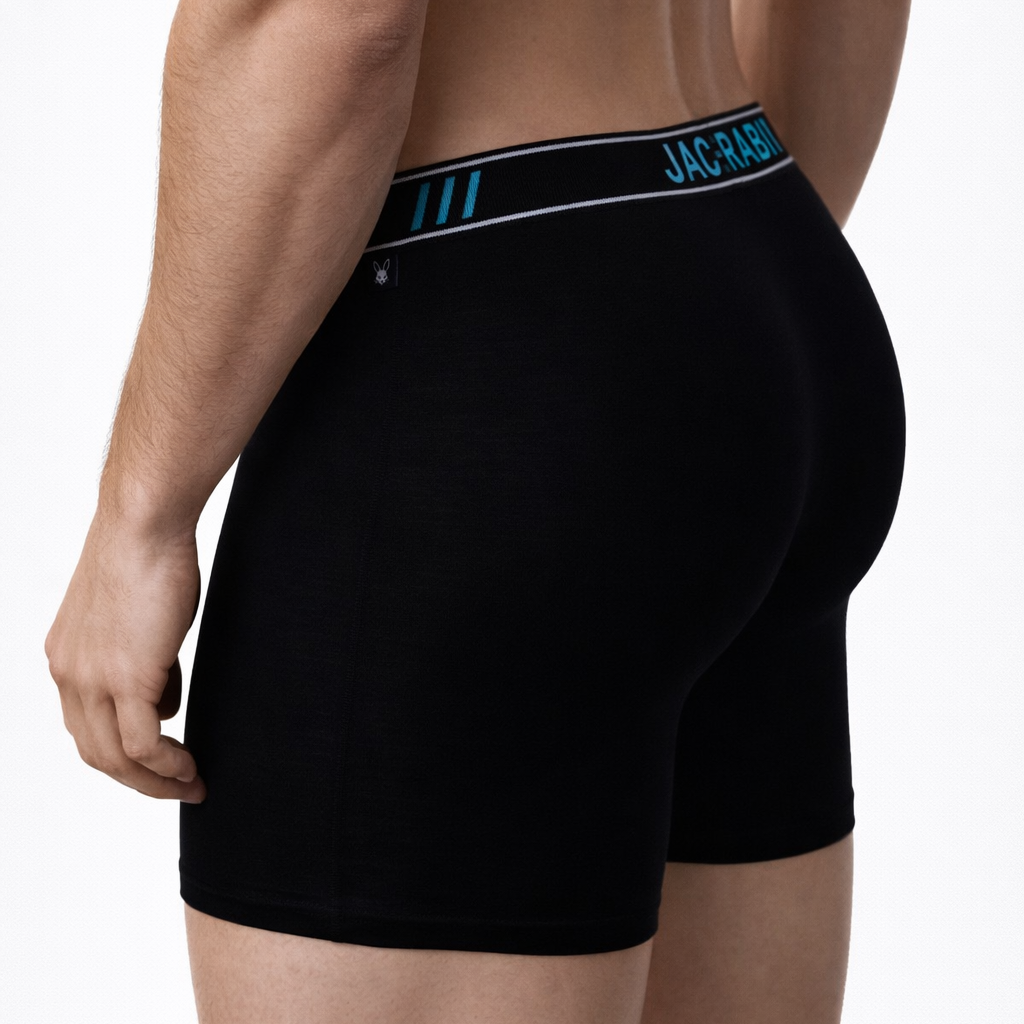 Black boxer briefs with a jackrabbit brand waistband on a white background
