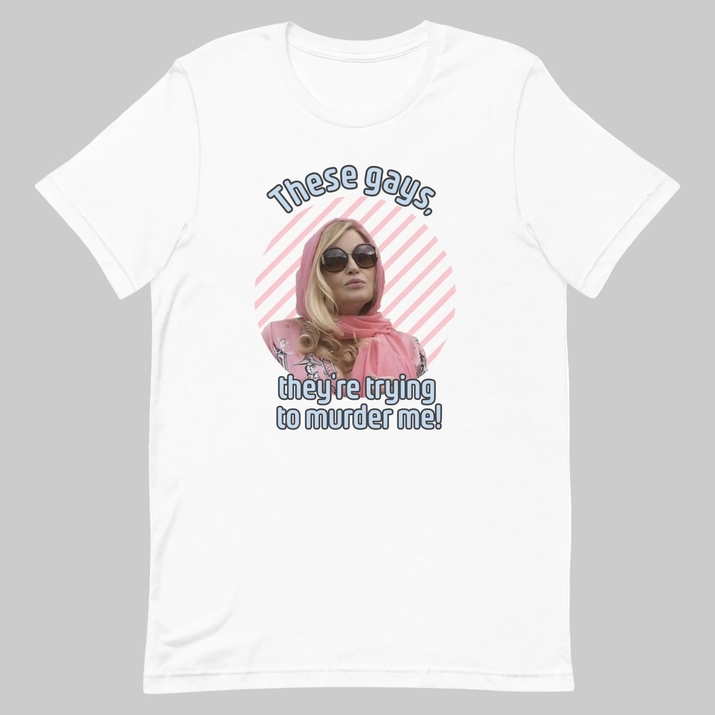White colored t-shirt with an image of Jennifer Coolidge wearing sun glasses and a pop culture quote "These Gays, They’re Trying To Murder Me”