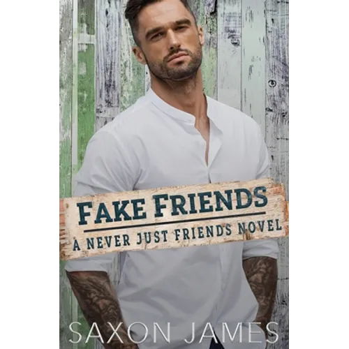 Book cover of 'Fake Friends: A Never Just Friends Novel' by Saxon James with a man in a white shirt against a wooden background.