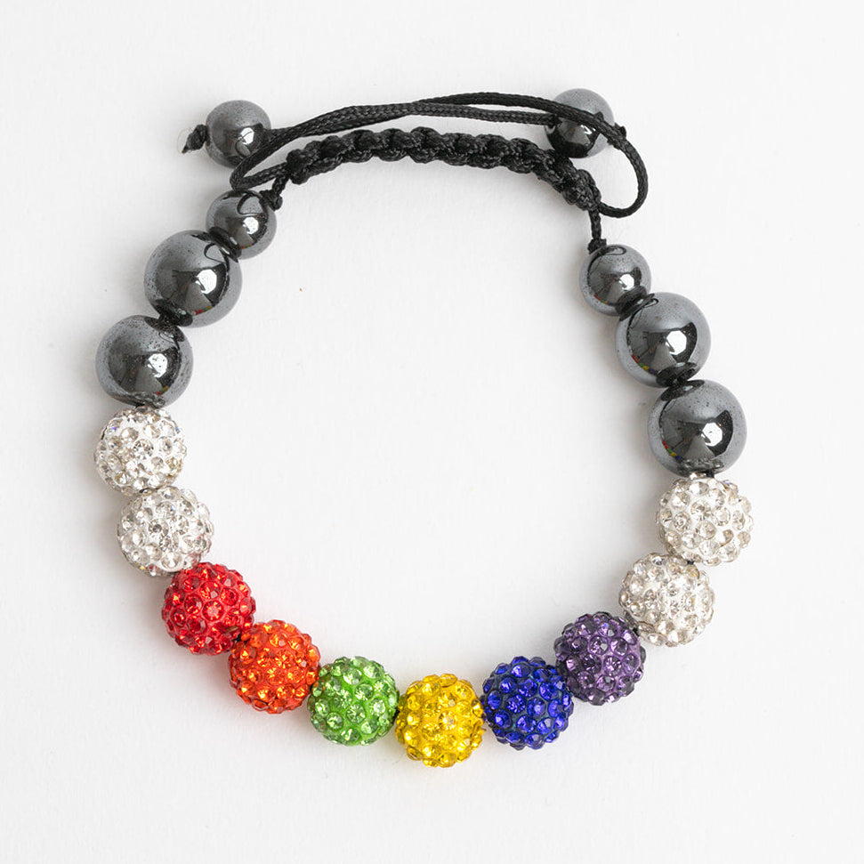 LGBTQ pride bracelet with rainbow colored beads on a white background