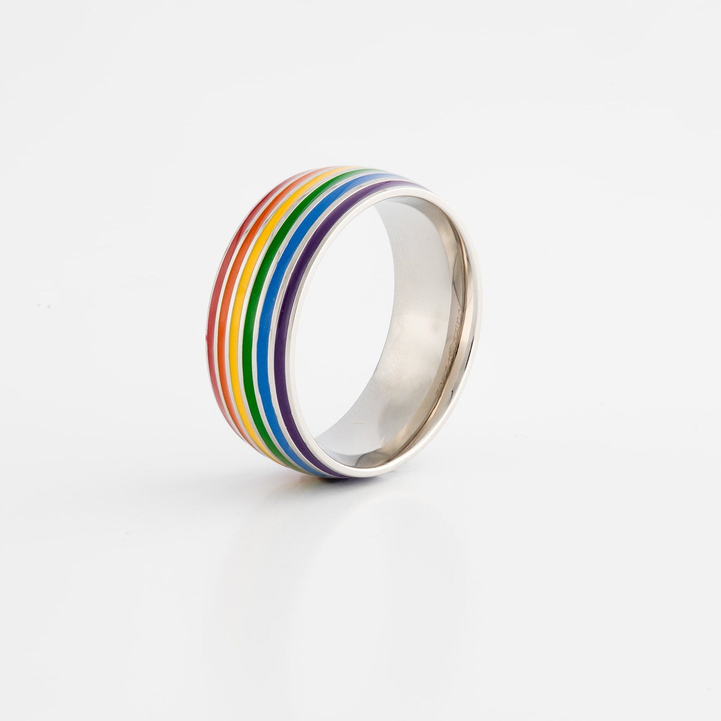 Ring with lgbtq pride rainbow stripes on a white background