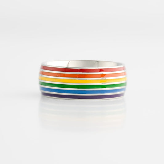 Ring with lgbtq pride rainbow stripes on a white background