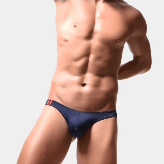 Navy men's underwear with orange accents on a plain background