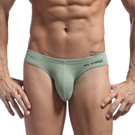Mens green underwear with brave person brand logo on a white background