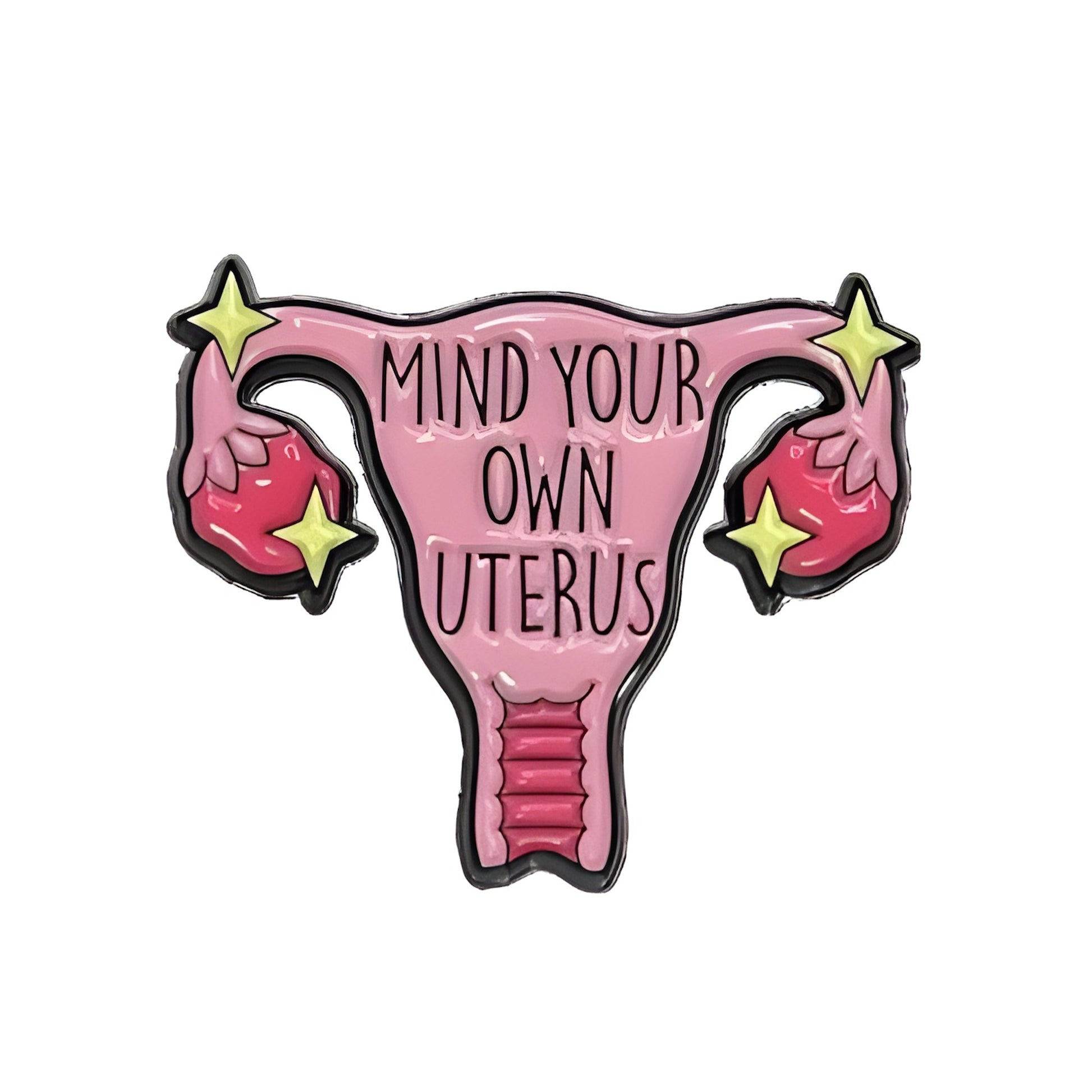 Pink uterus lapel pin with 'Mind your own uterus' text on a white background