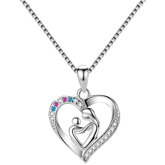 Silver necklace with a heart-shaped pendant featuring a family design on a white background