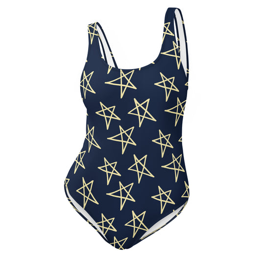 Navy blue swimsuit with yellow star pattern on a white background