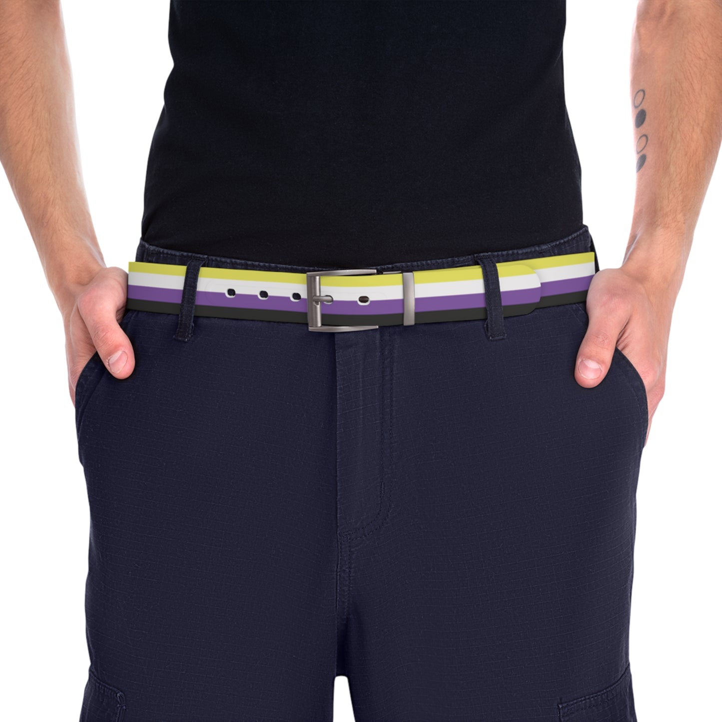 Person wearing navy pants with an enby pride stripe colored belt on a white background