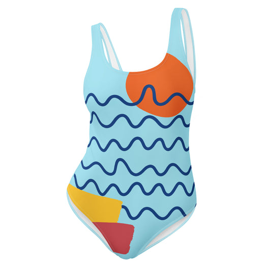 Colorful one-piece swimsuit with wavy patterns on a white background