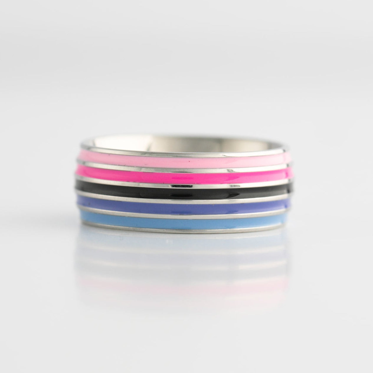 Silver ring with omnisexual pride stripes on a white background