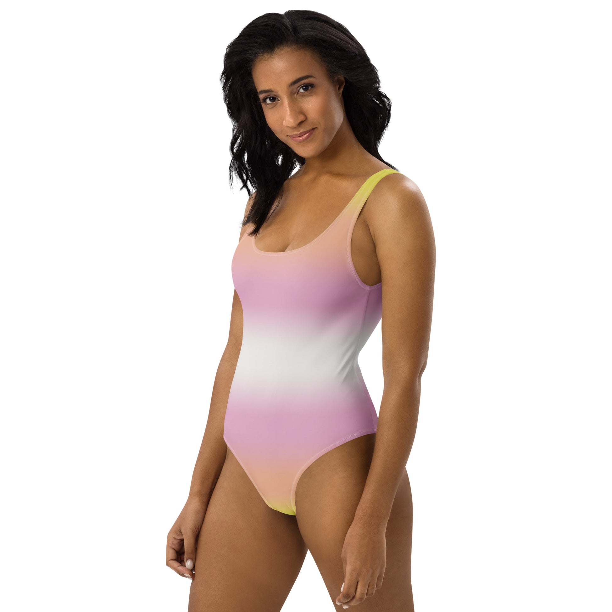 Woman wearing a pangender pride gradient swimsuit on a white background