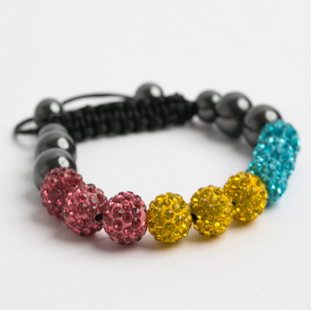 Pansexual pride colored beaded bracelet on a white background