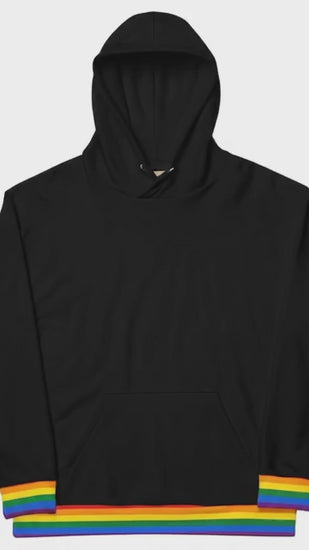 Short video of person wearing lgbtq pride hoodie rainbow inside hood cotton pullover