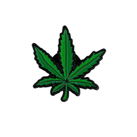 Green cannabis leaf lapel pin on a white background