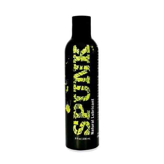 black bottle with lid and yellow text 'SPUNK' natural lubricant on a white background.