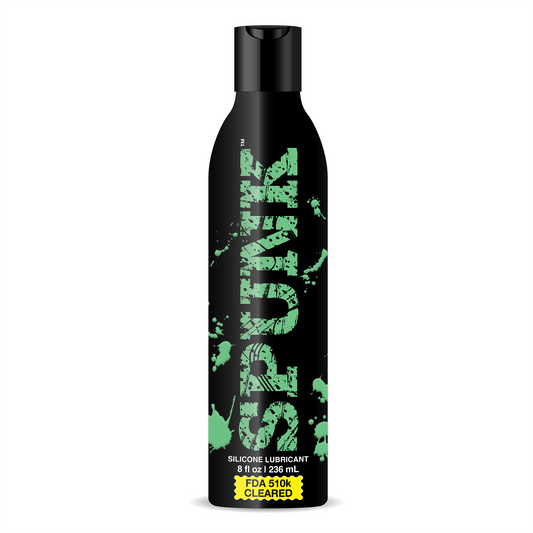 black bottle with lid and green branding that says 'SPUNK' silicone lubricant