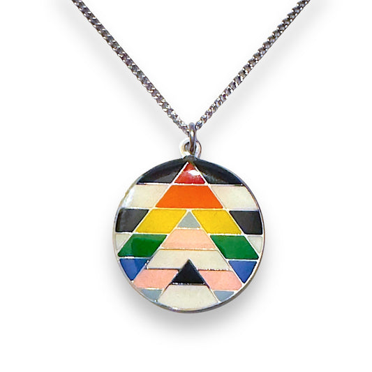 Necklace with a colorful geometric pendant on a white background