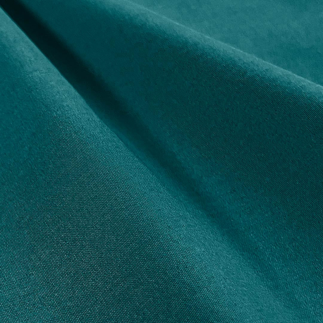 Close-up of teal fabric with visible texture