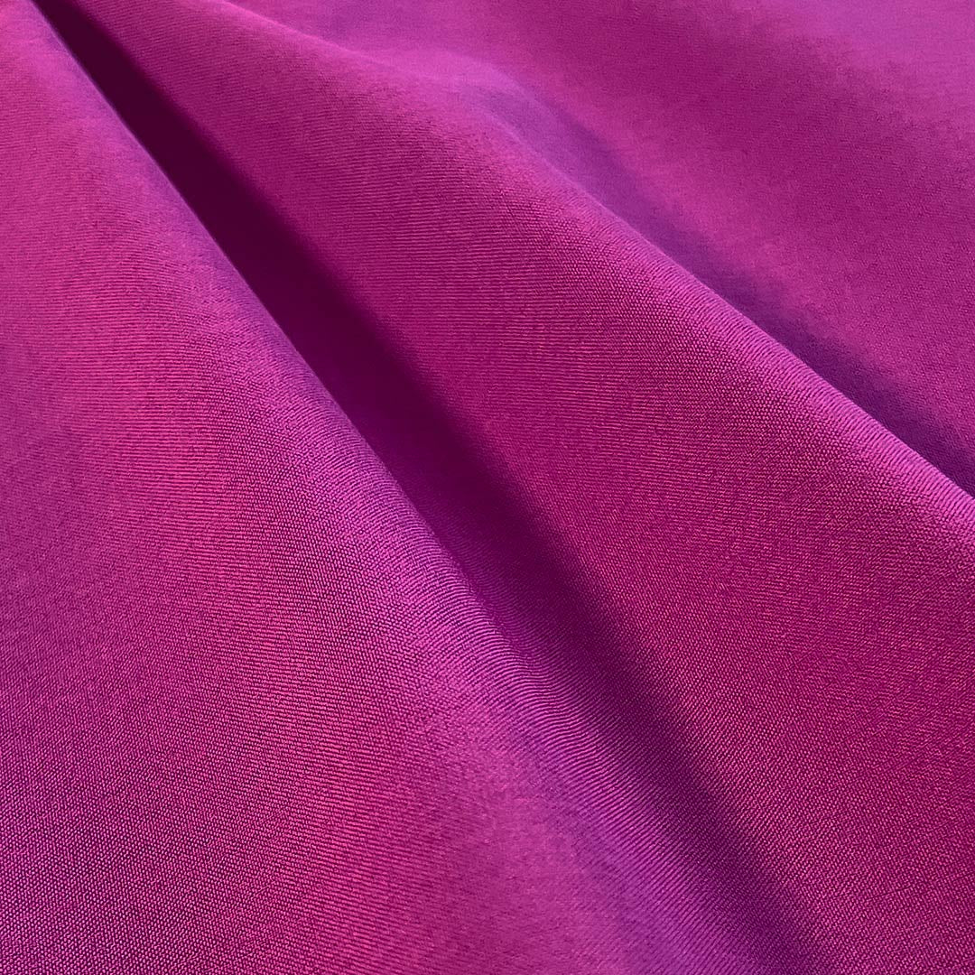 Close-up of purple fabric with folds