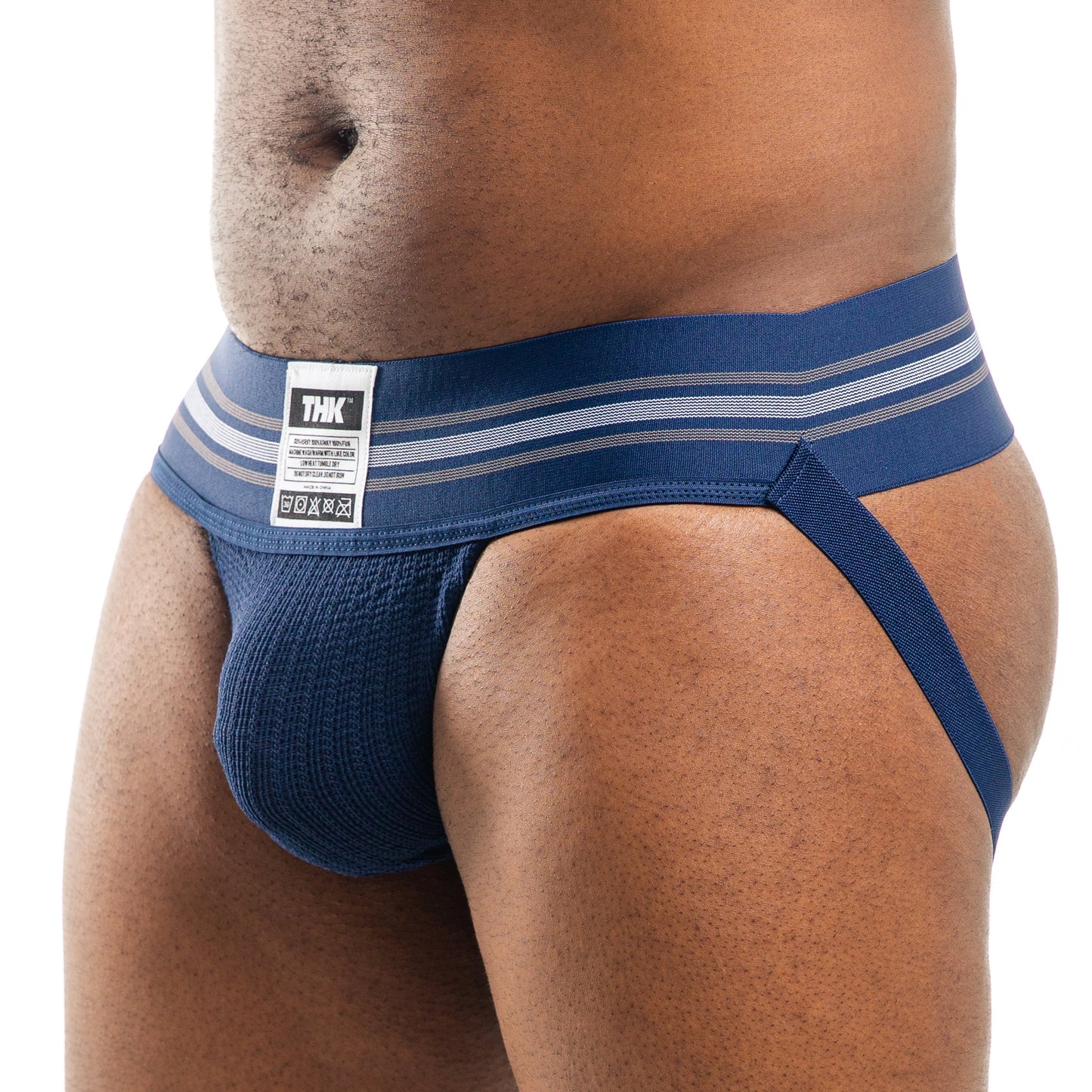Blue men's jockstrap with a visible brand label on a white background
