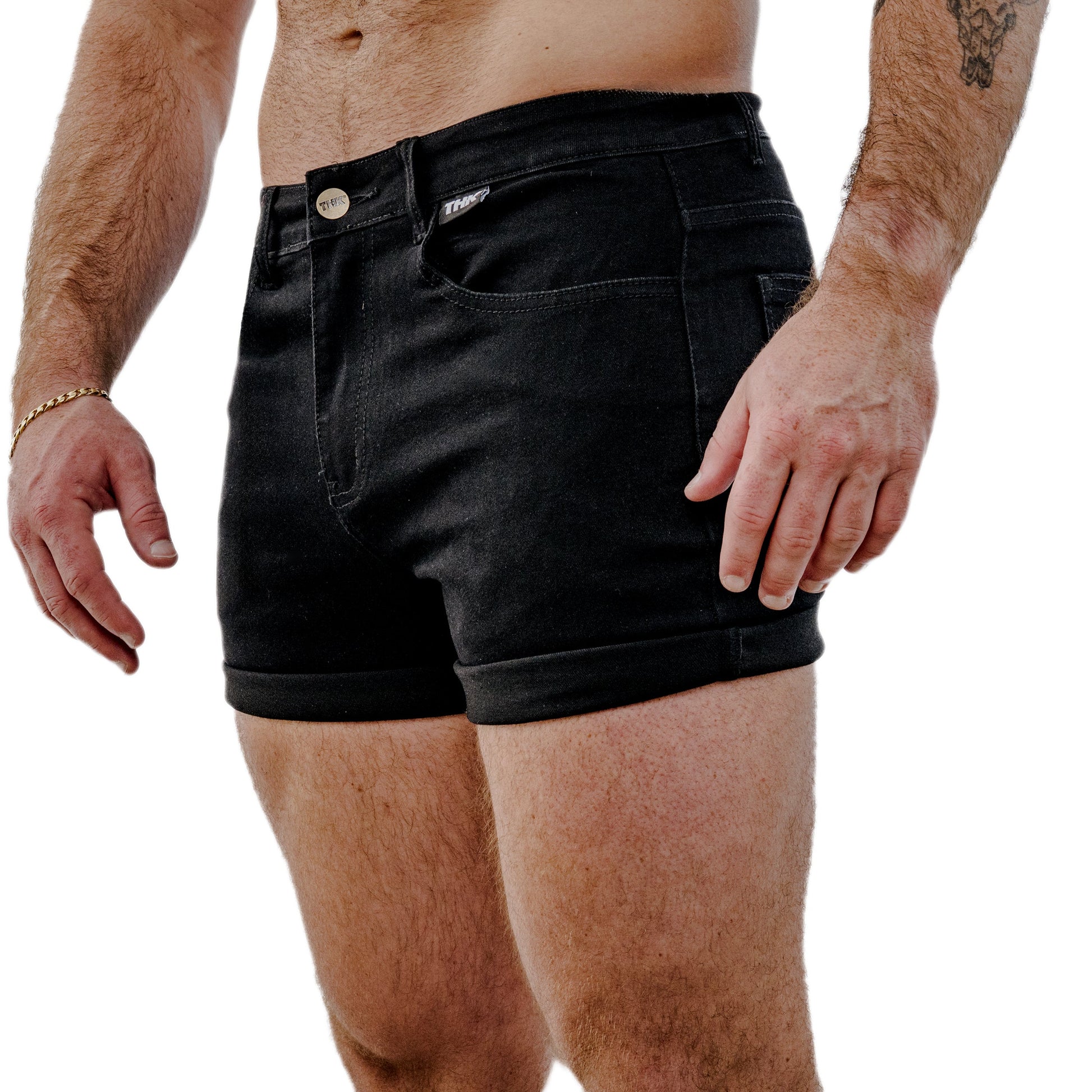 Black shorts worn by a man on a white background