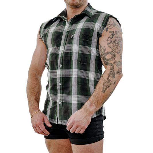 Man wearing a green plaid sleeveless shirt on a white background