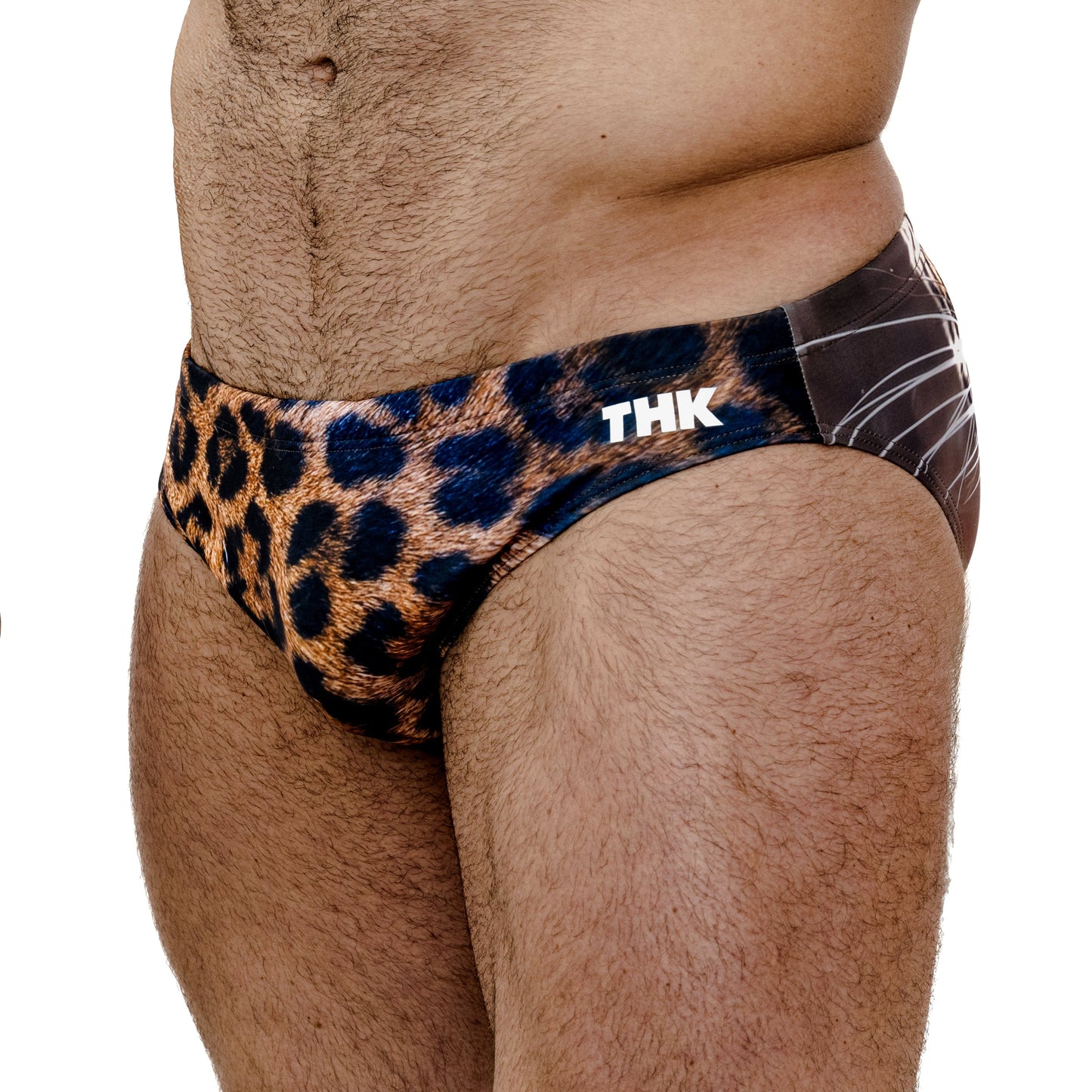 Cheetah print men's swim briefs with 'THK' branding on a white background