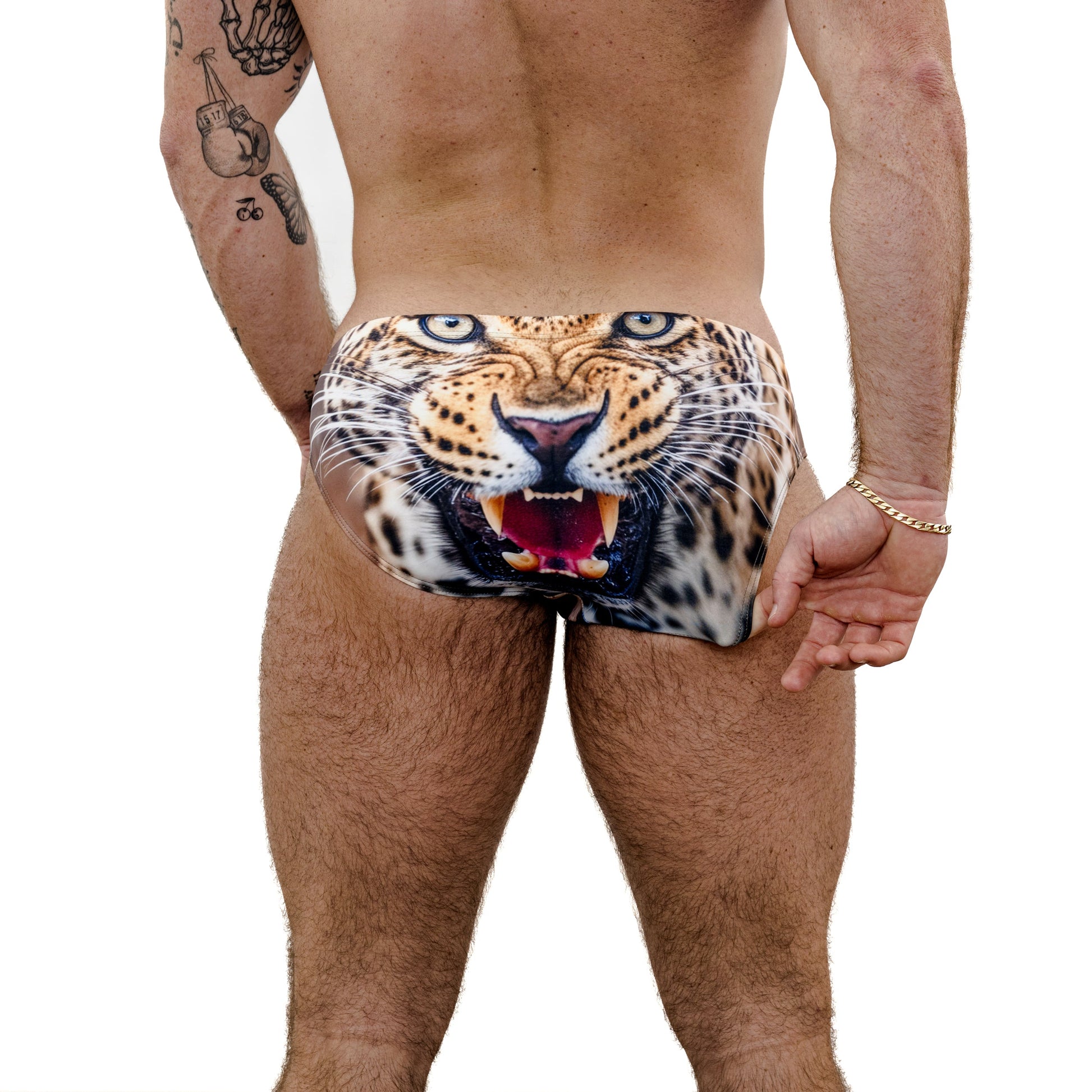 Person wearing a swimsuit with a tiger face design on a white background