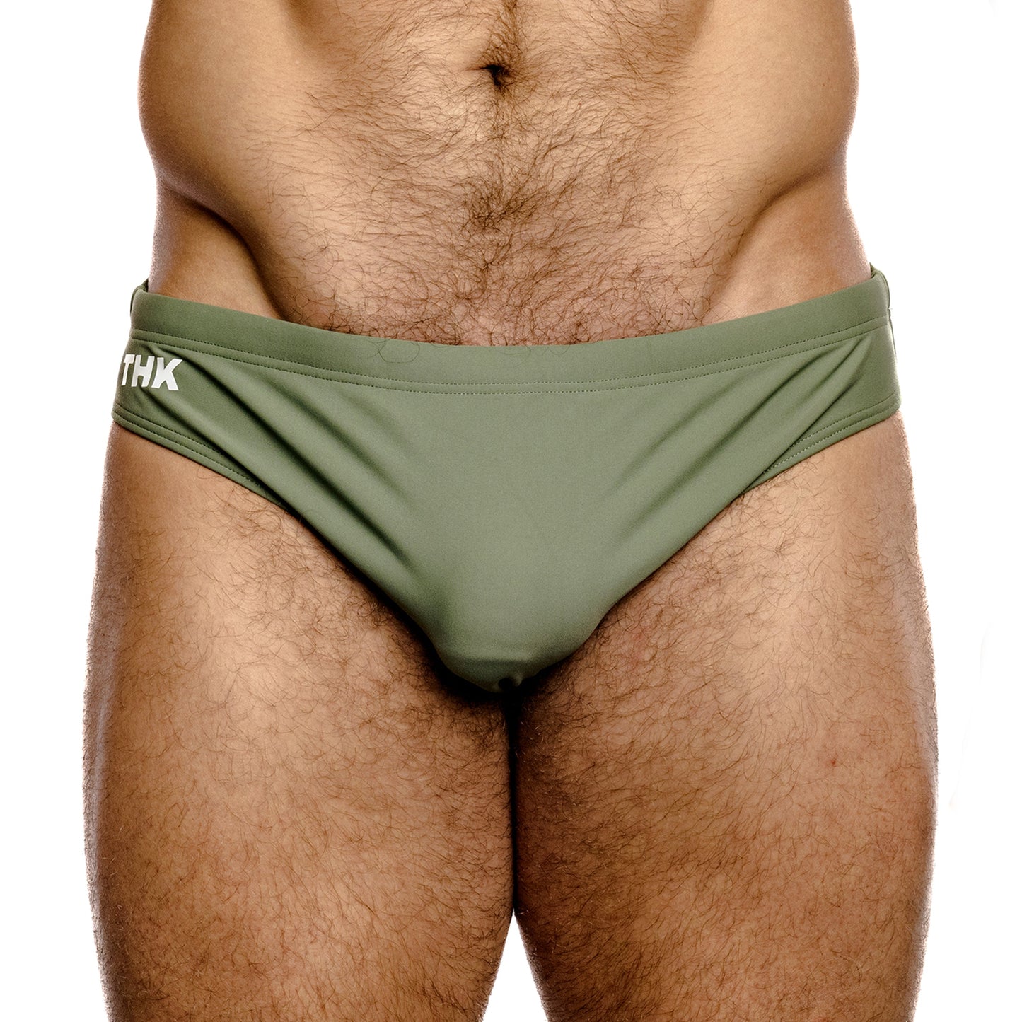Sage green men's speedo with 'THK' branding on a white background