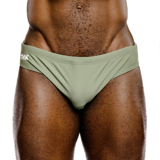 sage green men's swimwear with 'THK' branding on a white background