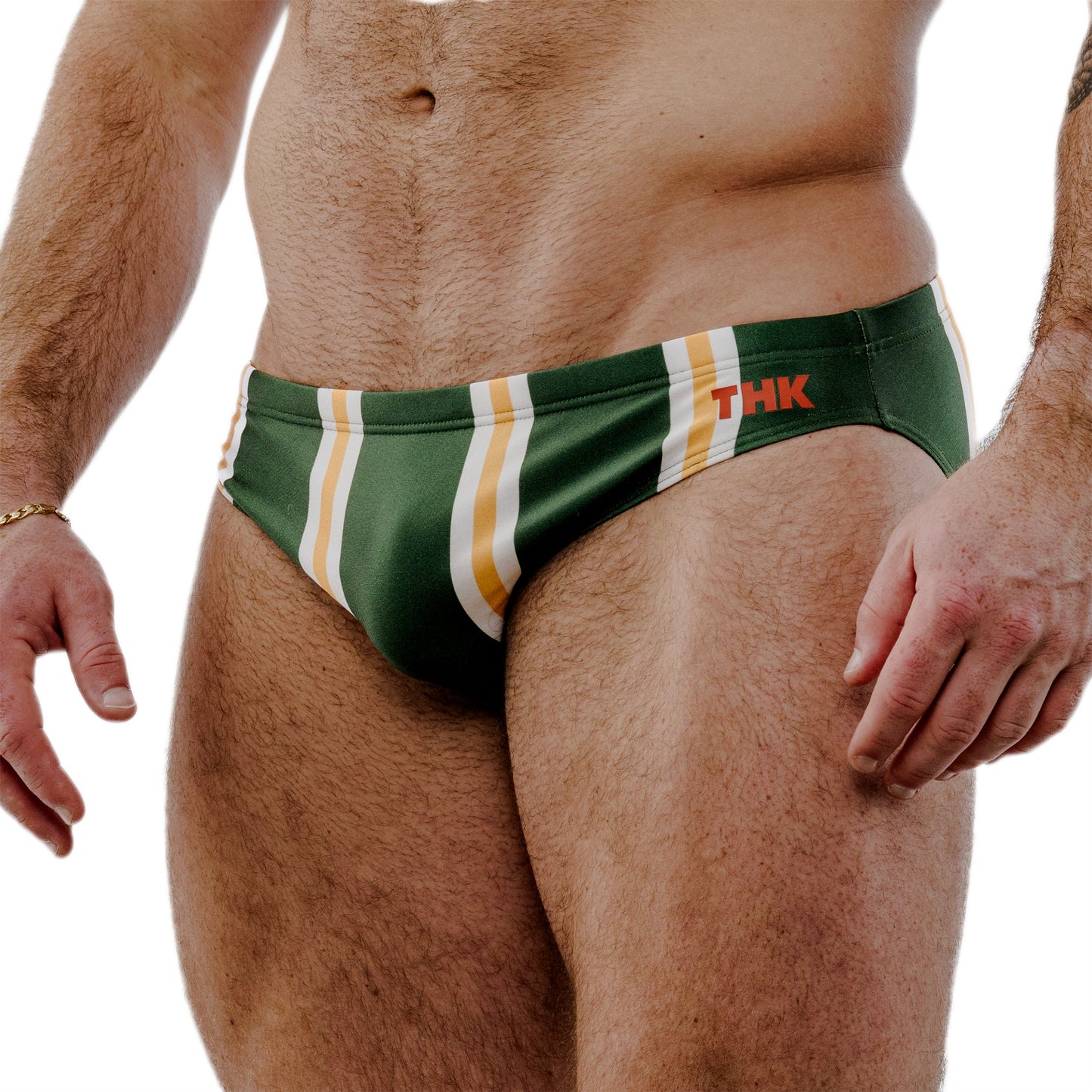 Green speedo with striped pattern and 'THK' branding on a white background