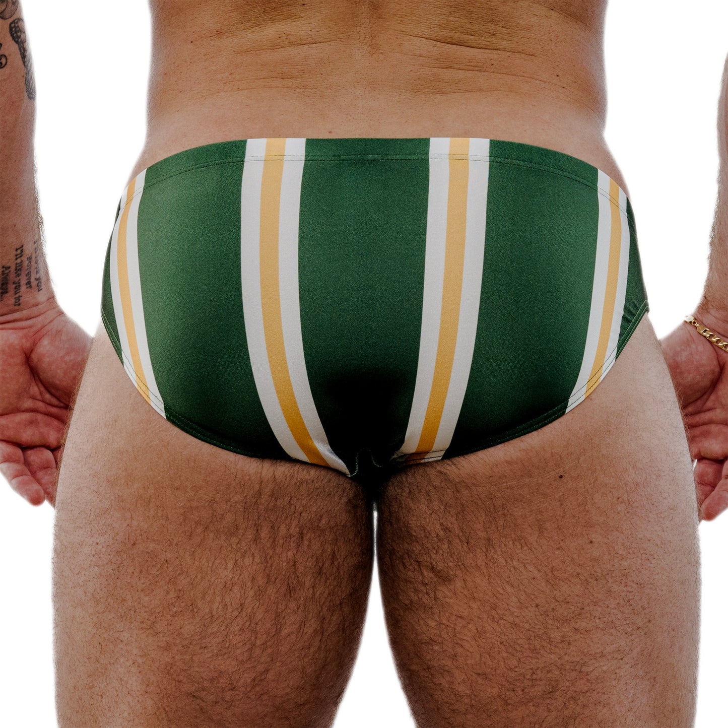 Green speedo with white and yellow stripes on a white background