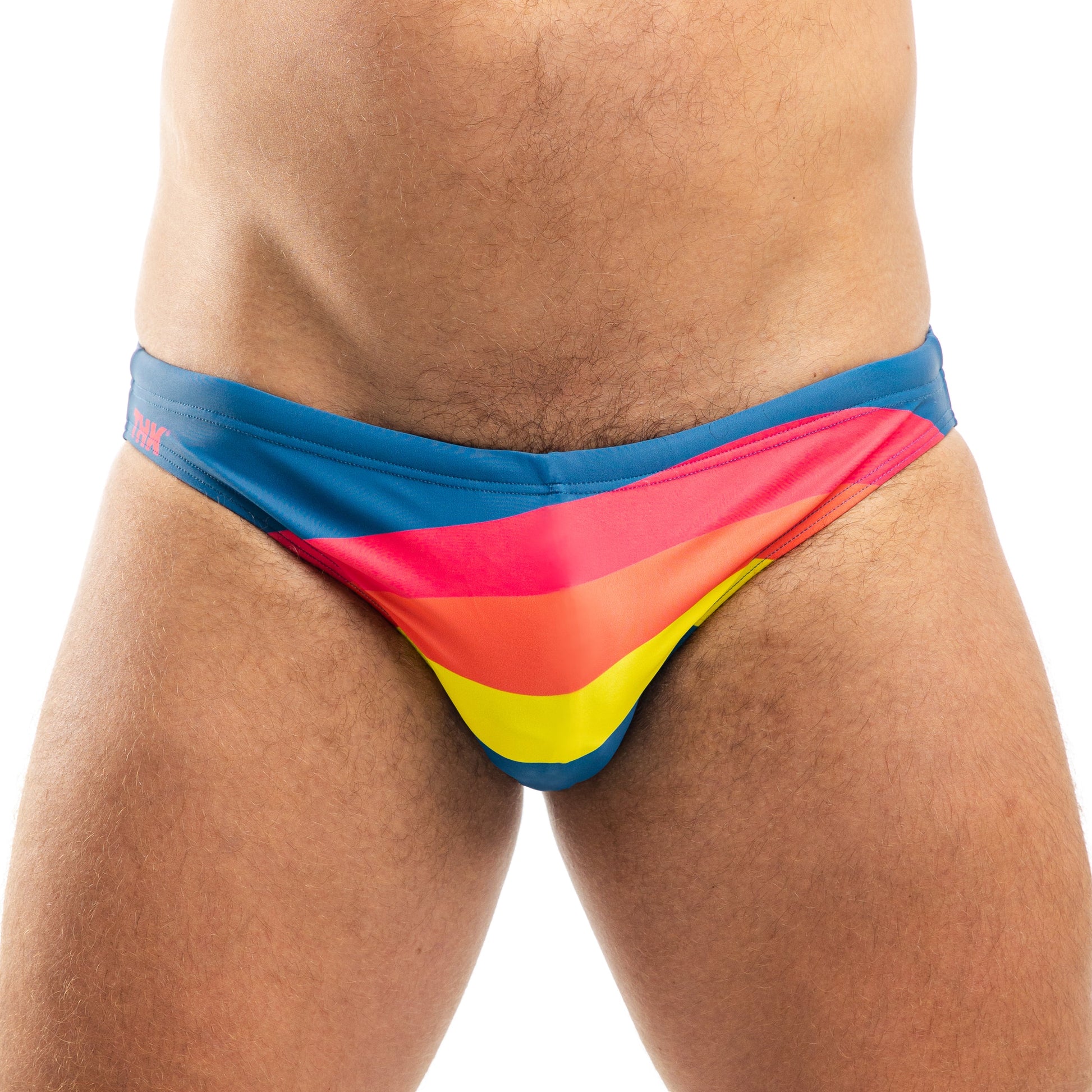 Colorful men's swim briefs with a white background