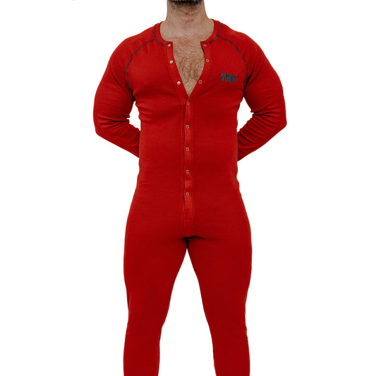 Red adult onesie worn by a person on a white background