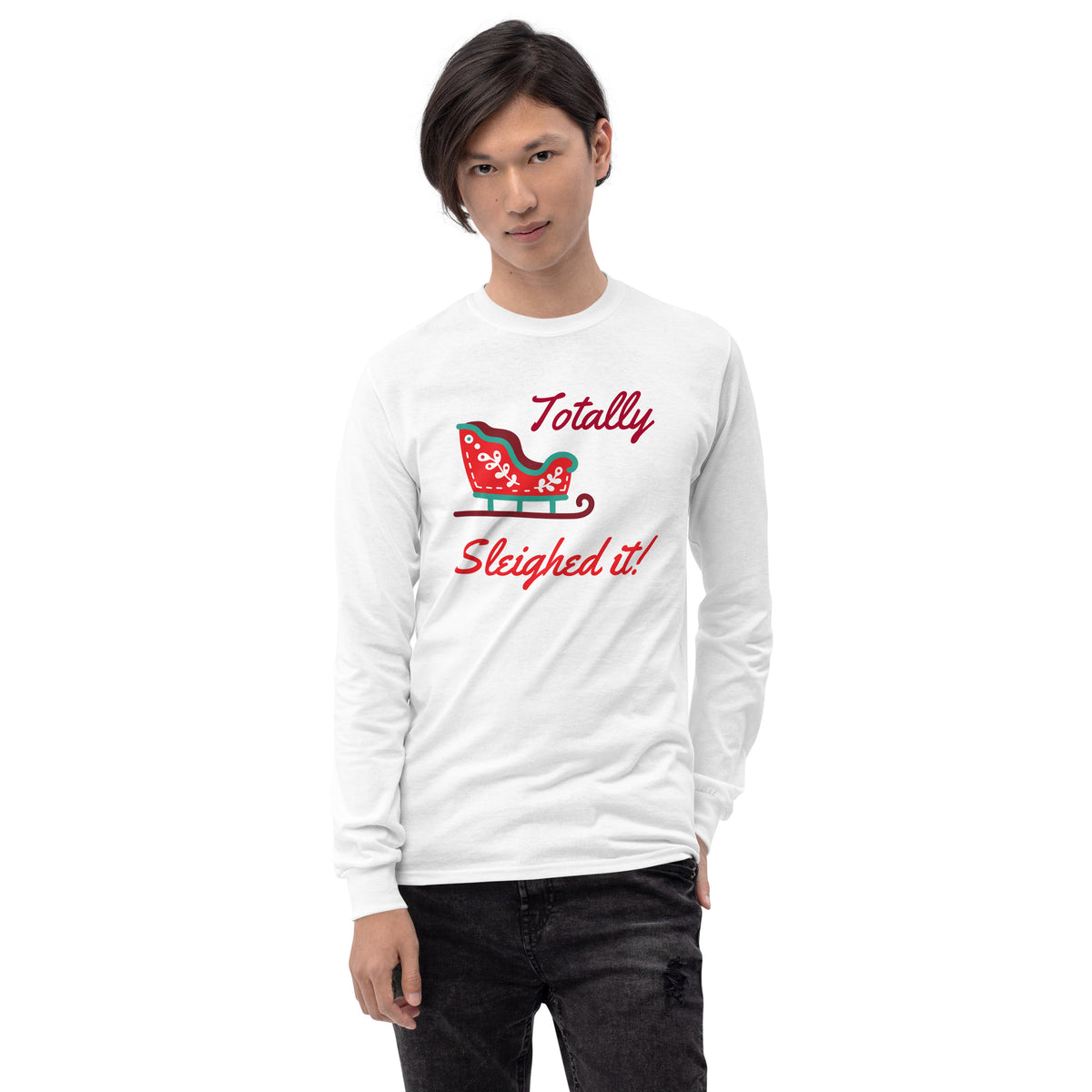 person wearing a white long sleeve tee shirt with a red holiday sleigh and red text that reads 'Totally Sleighed it!'