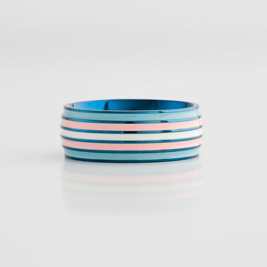 Blue steel ring with transgender pride stripes on a white background