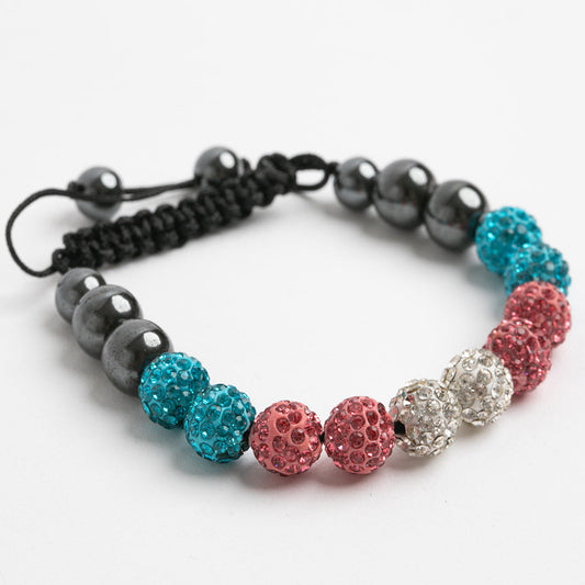 trans pride flag colored beaded bracelet on a white background